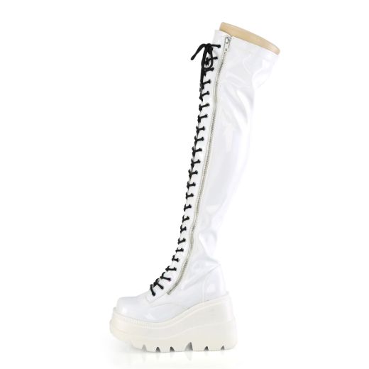 Product image of Demonia SHAKER-374 White Holographic Stretch Patent 4 1/2 inch Wedge Platform Lace-Up Thigh-High Boot Outside Zip